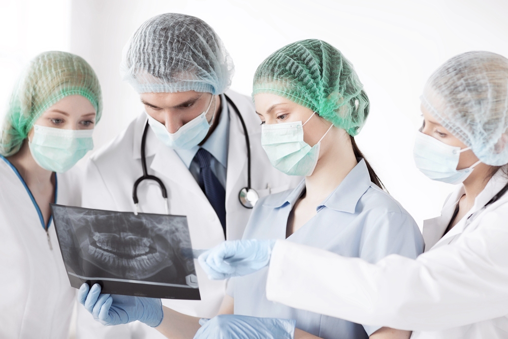 young group of orthodontist looking at x ray - Mouth Breather Face: What It Is, What Causes It, and Whether It Can Be Corrected in Sunnyvale TX